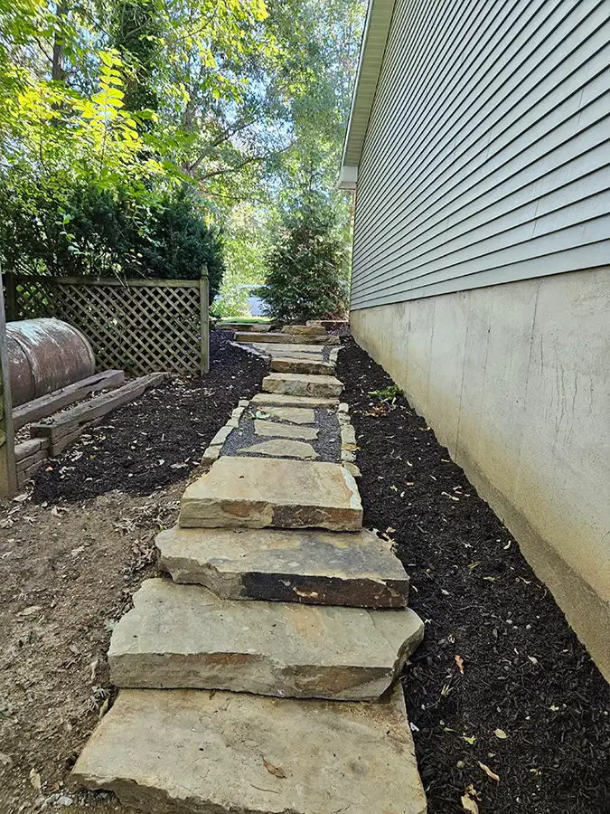 Monarch Landscaping - Projects - Howard backyard retaining wall, walkway and patio - after - Springfield, IL